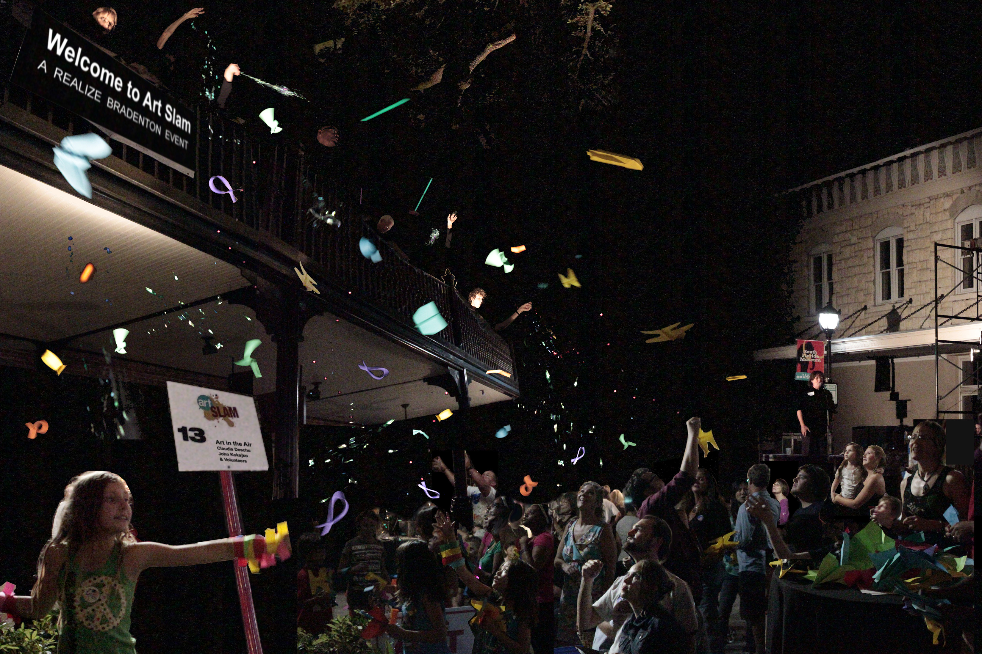 Art in the Air – paper airplanes being launched from balcony and caught by audience